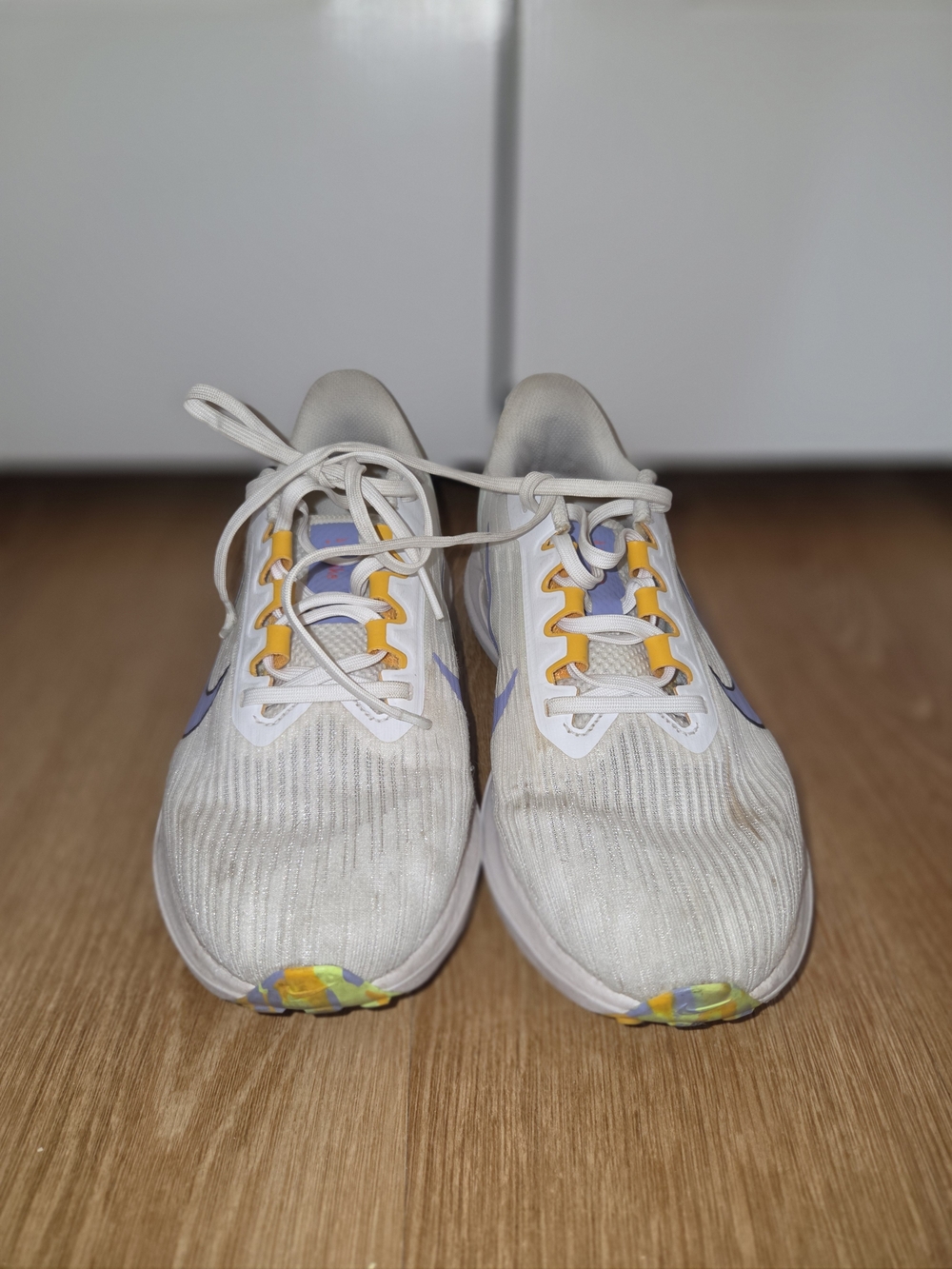 Nike Women's White & Purple Running Shoes with Yellow Accents